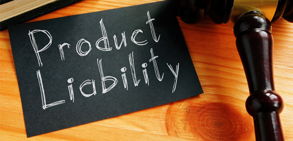 Product liability concept with gavel and book, representing legal responsibility in product safety issues.