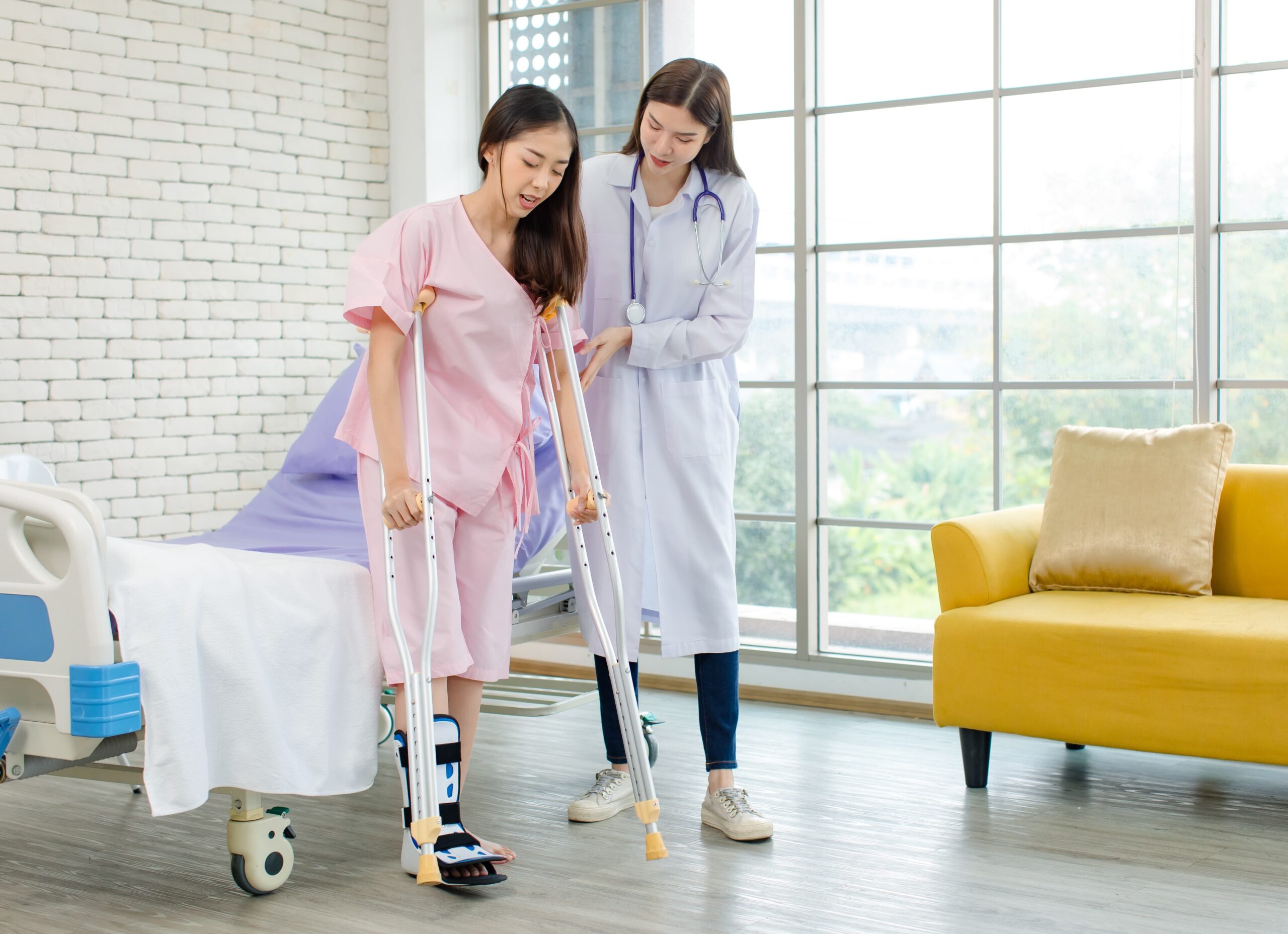 medical professional helping injured person receive care after car accident