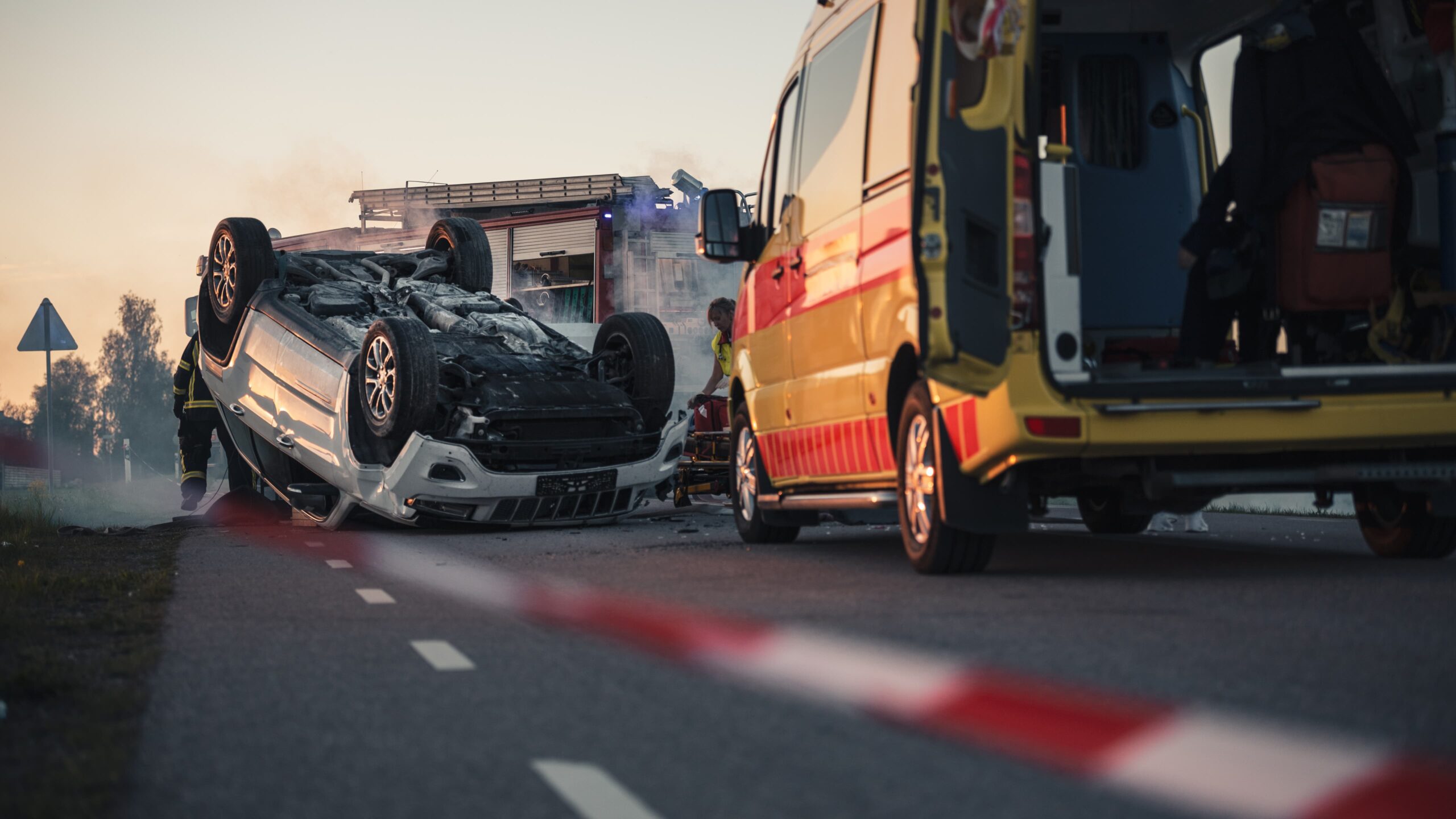 cars involved in highway accident with first responders assisting at the scene
