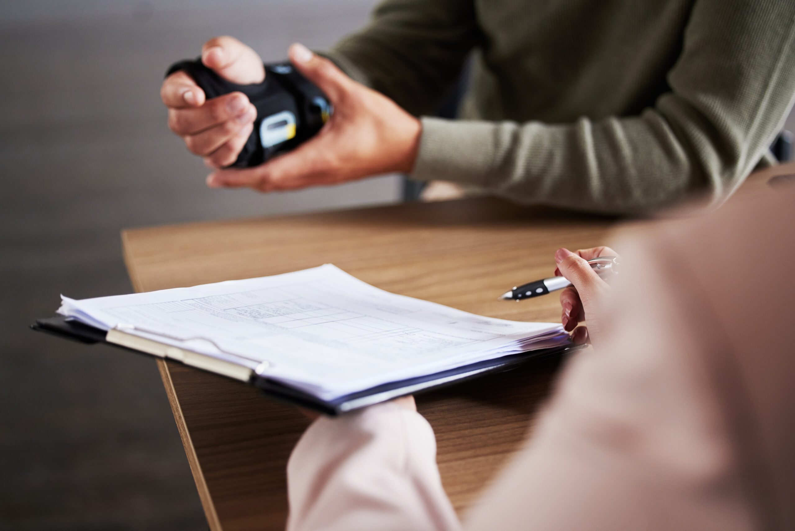 Attorney reviewing crucial evidence in truck accident case with client