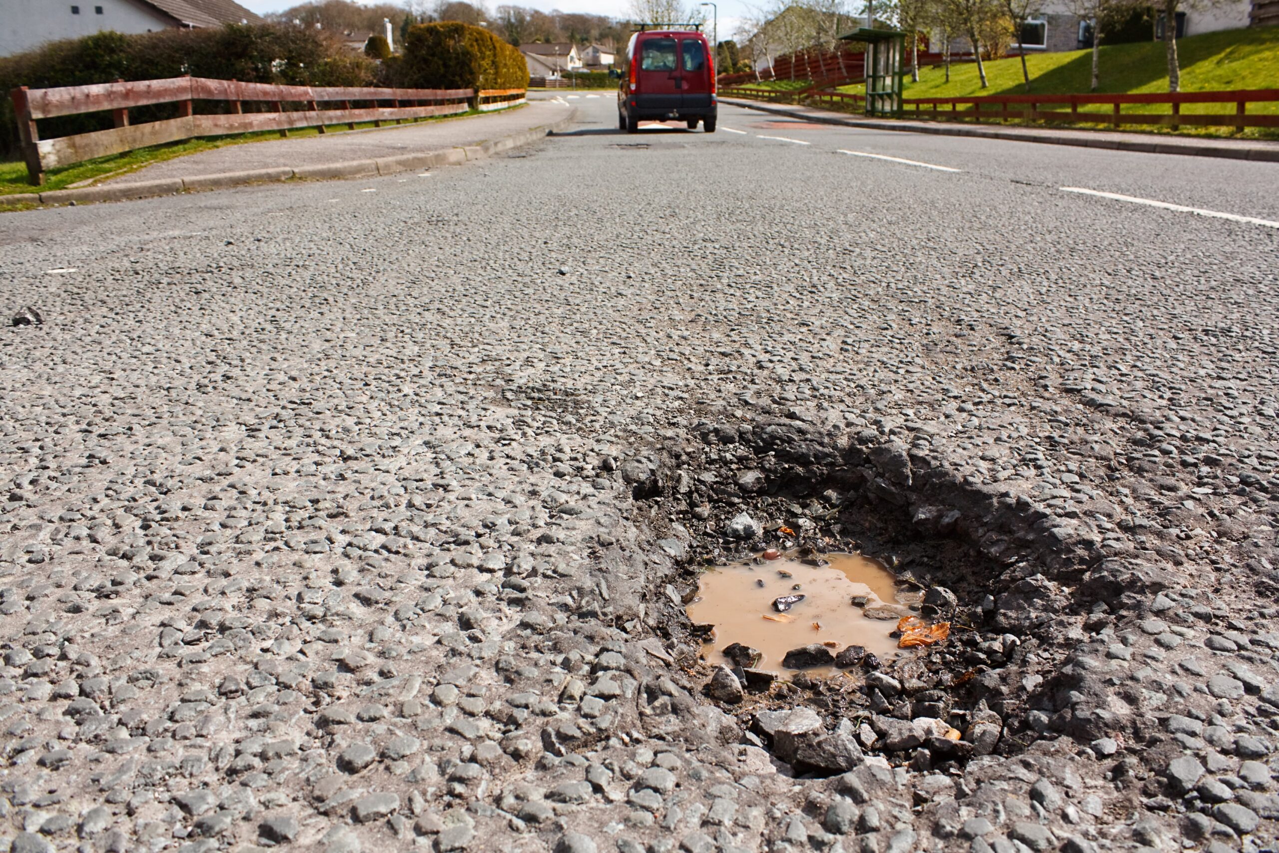 motorcycle crash causes road hazard