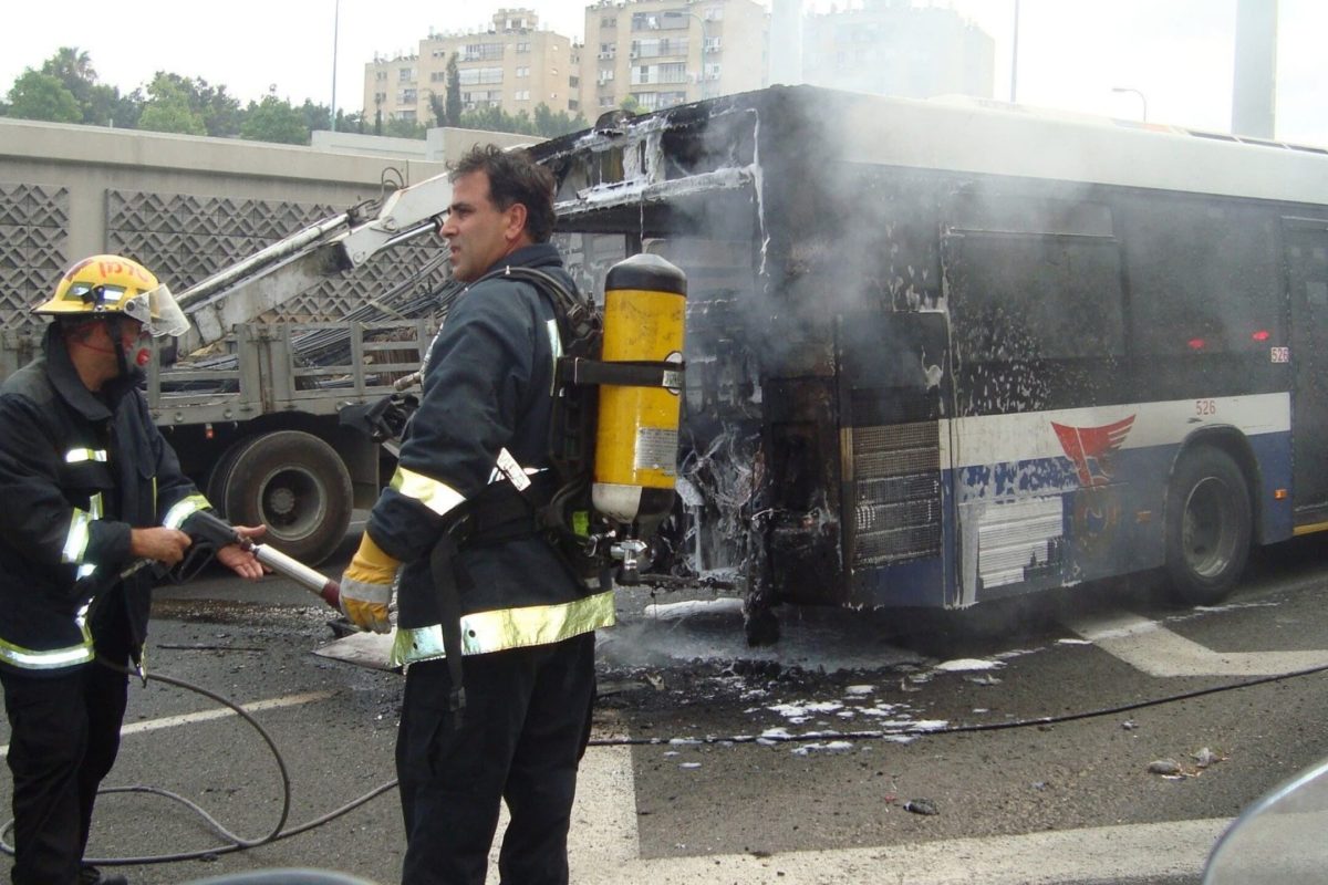 Legal rights of passengers injured in bus accidents shown as passenger receives help