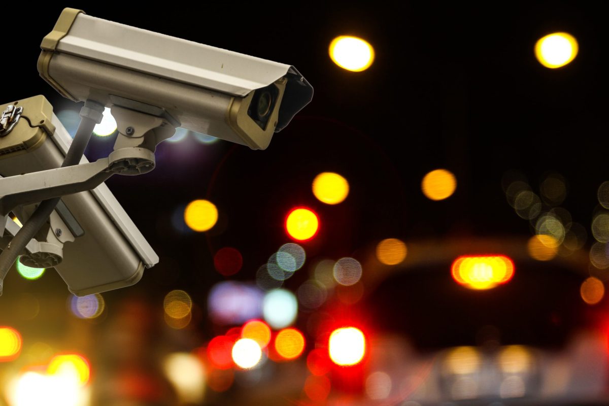 traffic camera footage capturing a car accident at a busy intersection