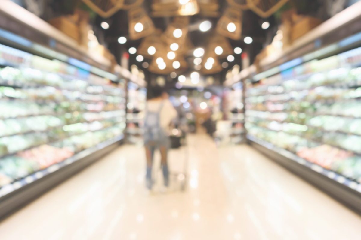 Customer slipping on a wet floor inside a retail store