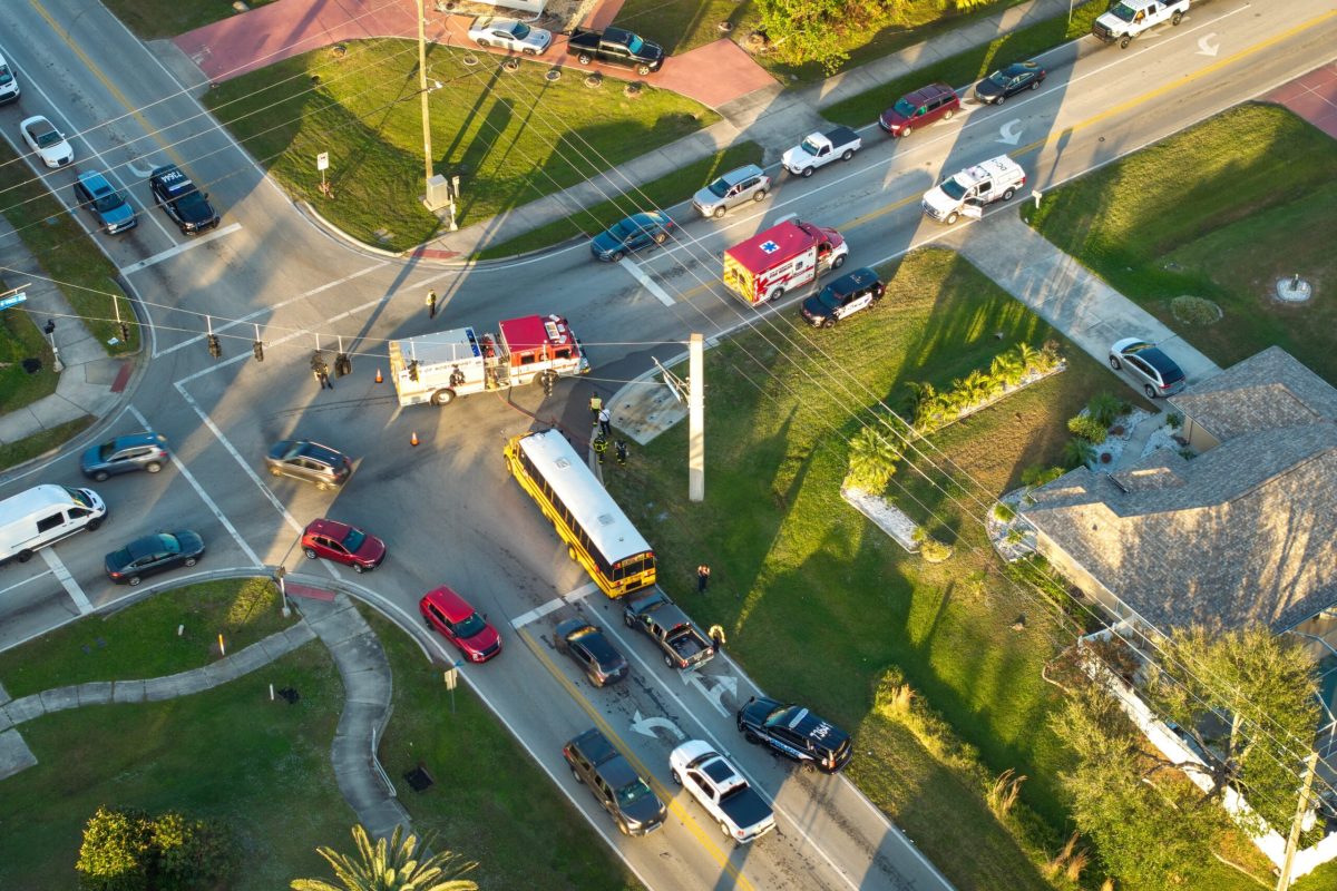 Common causes of public bus accidents shown in a crash scene at an intersection